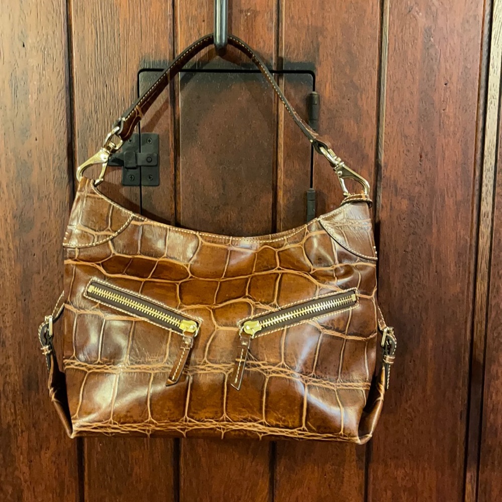 Dooney and Bourke giraffe leather. Gently used.